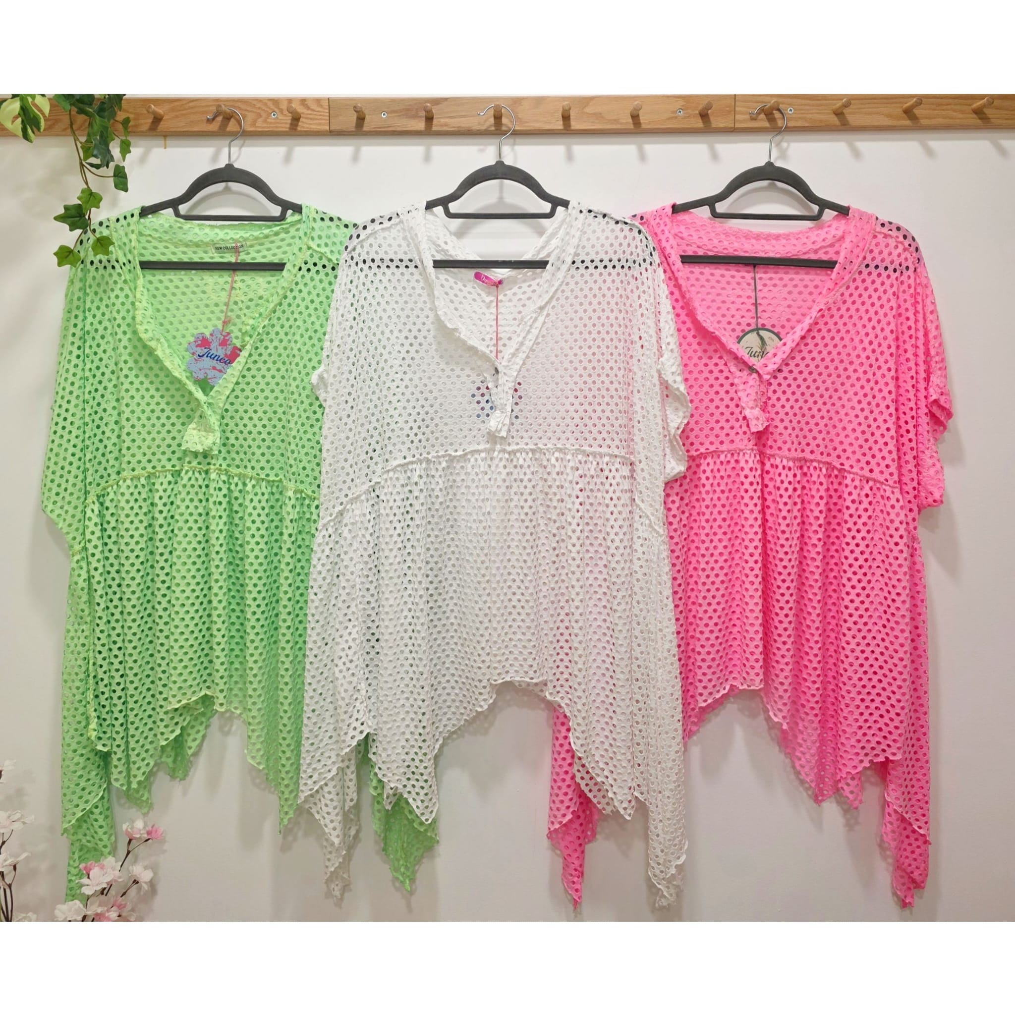 BLUSA CALADA ASIMÉTRICA